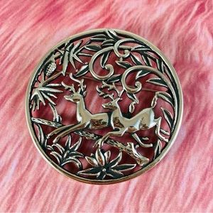 Vintage Sarah Coventry woodland deer circular brooch silver-tone